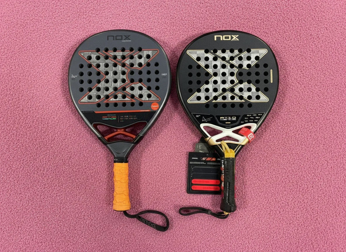 Two NOX padel rackets with large X designs and perforations on pink textured surface