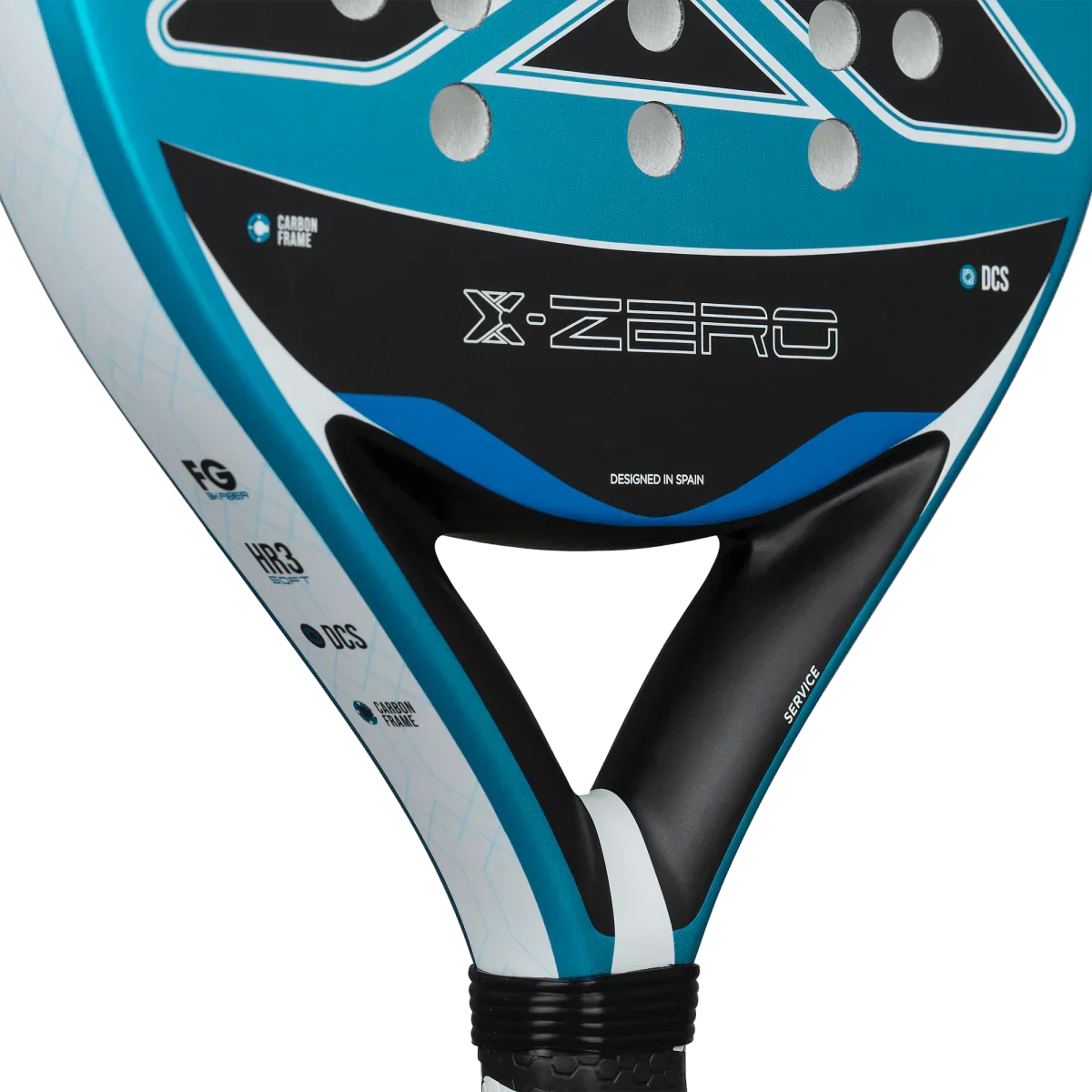 Close-up of a blue and black padel racket with 'X-Zero' branding on a white background